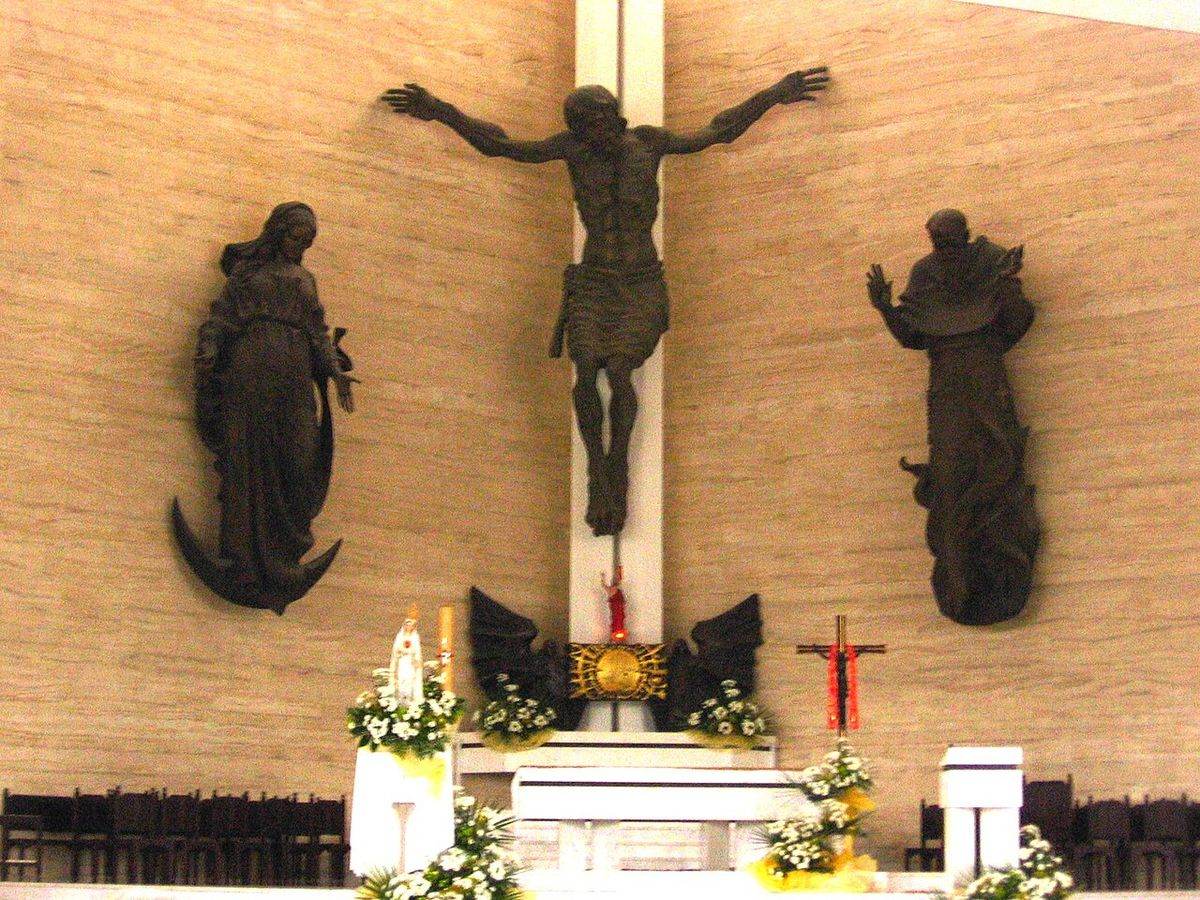 The sanctuary of the Church of St Maximilian Maria Kolbe, with the crucifix above the altar.